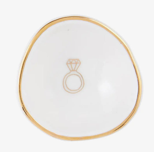 Handmade white ceramic ring dish with irregular, gold-lined edges and a minimalist gold diamond ring outline at the center. Available sizes: small, medium, large.