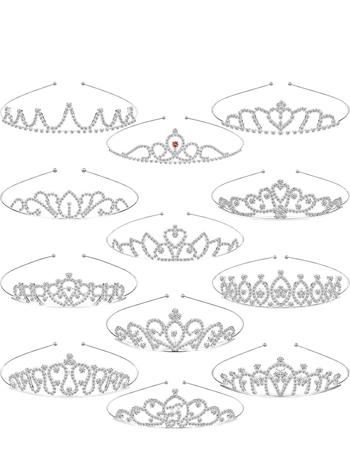 Ten silver-tone children’s rhinestone crown headbands in various designs.