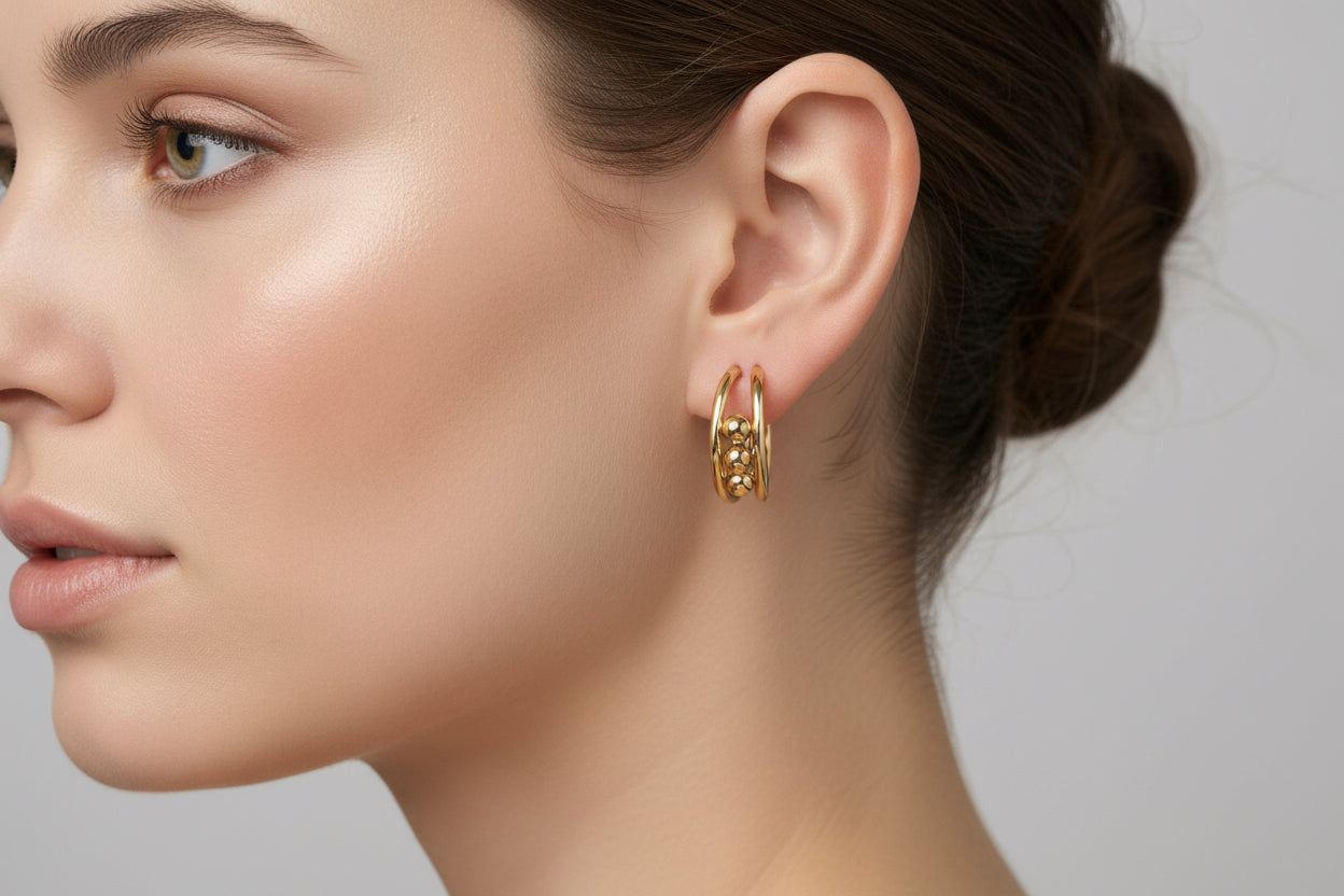 Hoop earrings with small decorative beads, available in 20mm, 30mm, and 40mm sizes.