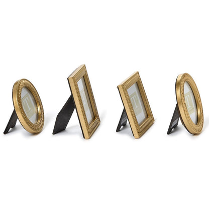 Set of four Laurel Wreath Gold Photo Frames—two oval, two rectangular—with ornate gold borders and black stands. Available in multiple sizes.
