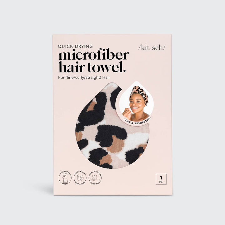 Boxed microfiber hair towel in brown, black, and white leopard print. Available in standard size. Promotes fast drying.