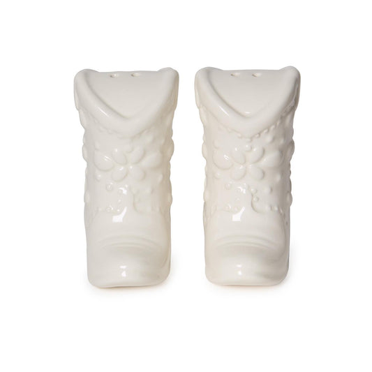 White ceramic cowboy boot salt and pepper shakers with floral embossed details. Available in standard shaker size.