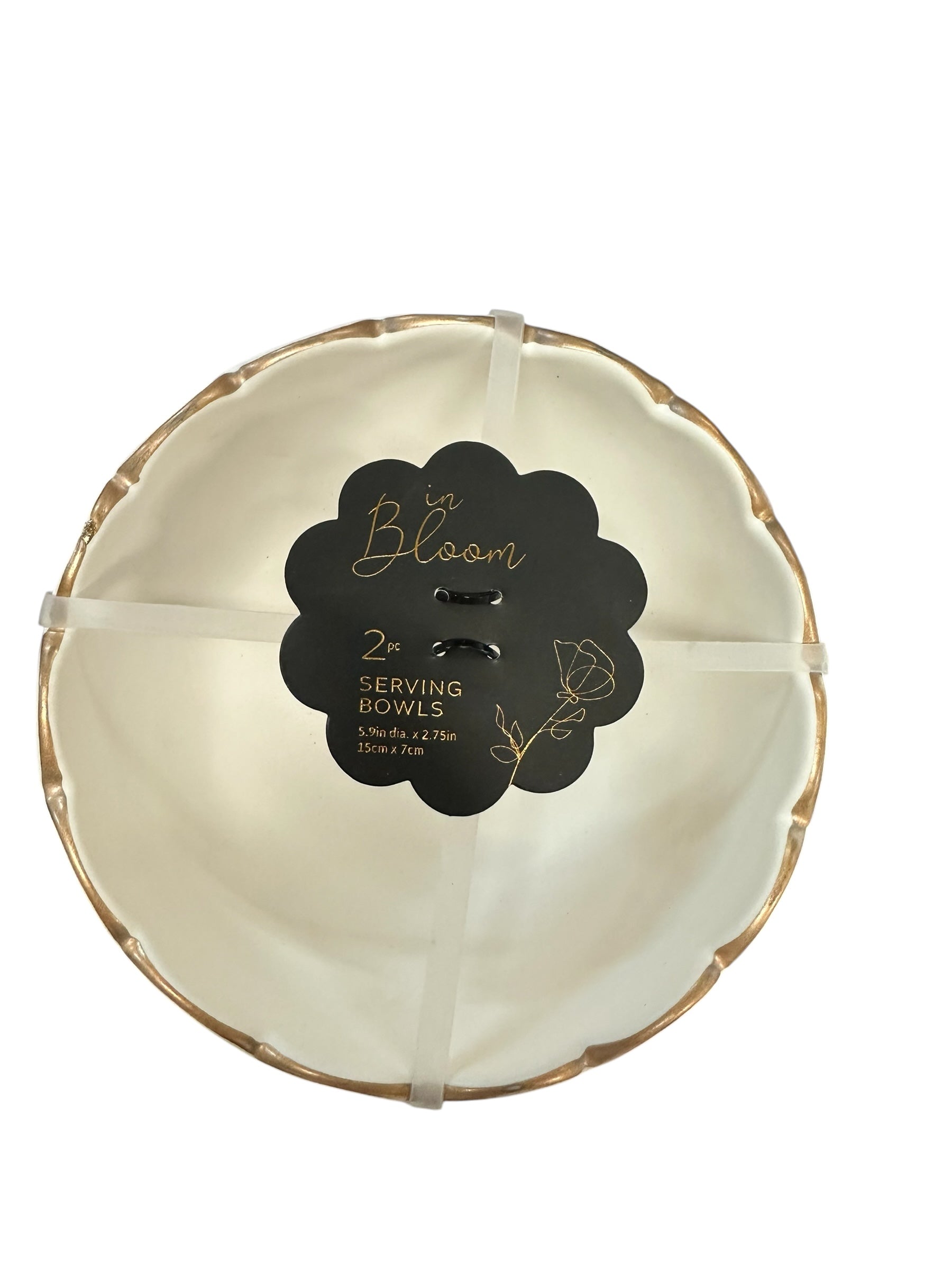 Set of two white ceramic bowls with gold rims, 9 in/22.5 cm, stacked together and secured with white bands.