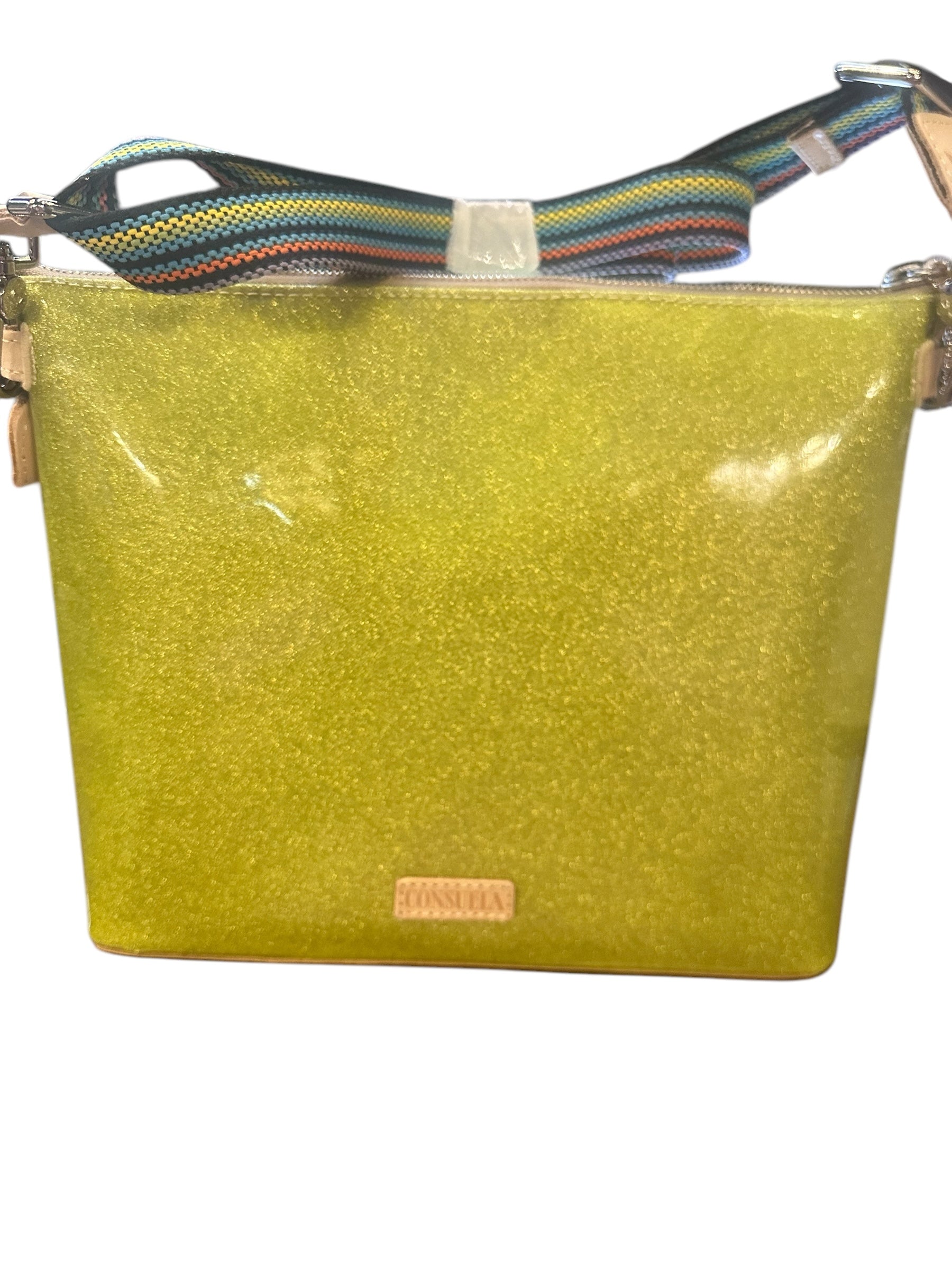 Yellow glittery crossbody bag with multicolored strap, pink front label. Available sizes: small, medium, large.