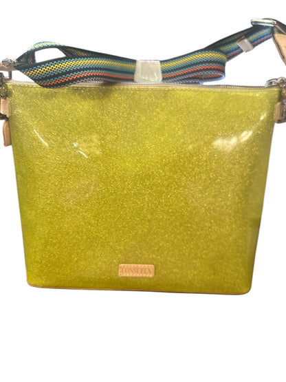 Yellow glittery crossbody bag with multicolored strap, pink front label. Available sizes: small, medium, large.