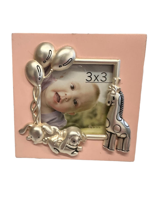 3" by 3" picture frame with pink base and metal animals surrounding the picture, Has giraffe, rabbit, and lamb with balloons