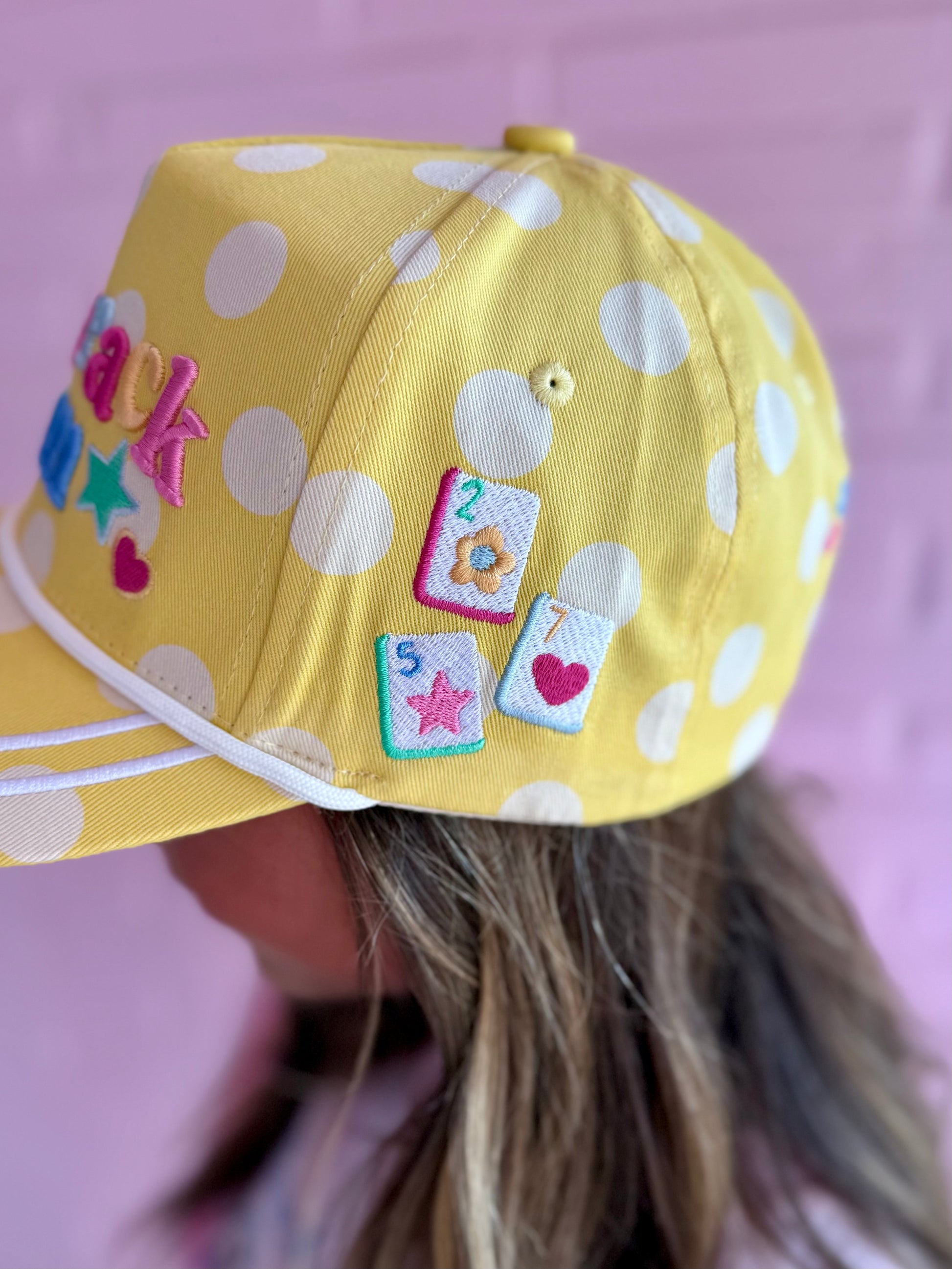 Yellow Dot Crack Bam Hat with polka dots, star, heart, mahjong tile patches, adjustable snapback. Available in S/M and M/L.