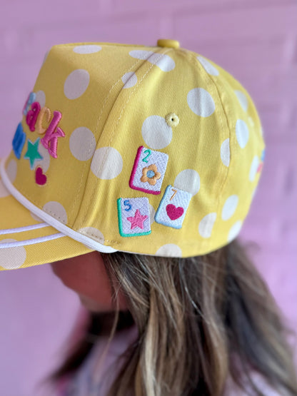 Yellow Dot Crack Bam Hat with polka dots, star, heart, mahjong tile patches, adjustable snapback. Available in S/M and M/L.