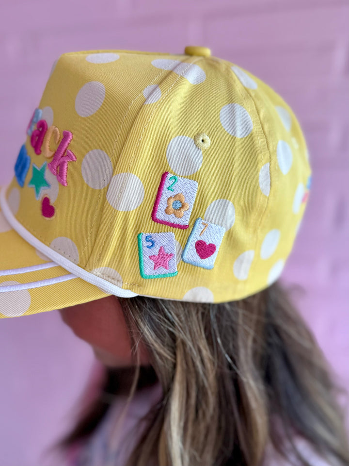 Yellow Dot Crack Bam Hat with polka dots, star, heart, mahjong tile patches, adjustable snapback. Available in S/M and M/L.