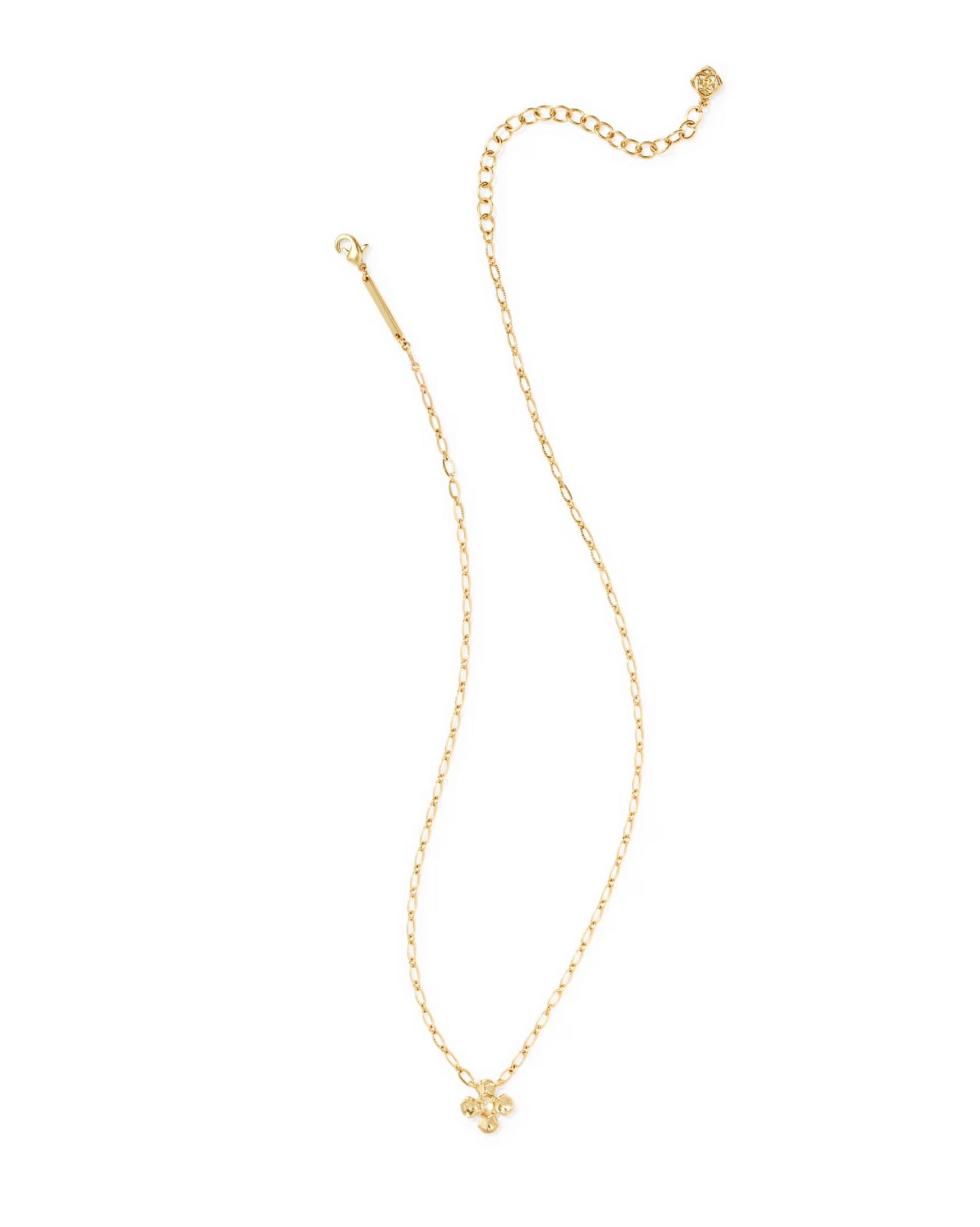The Leanne Short Pendant by Kendra Scott features a delicate linked chain, a small textured four-petal flower pendant, and a lobster clasp. Available in multiple sizes.