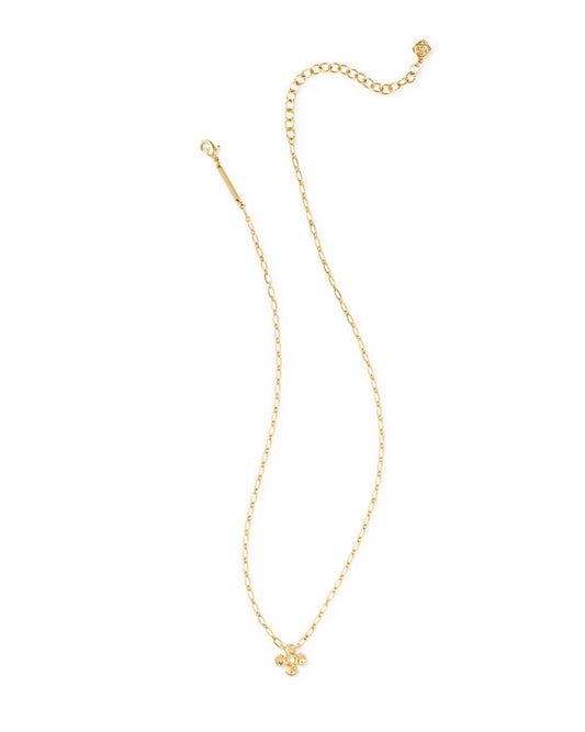 The Leanne Short Pendant by Kendra Scott features a delicate linked chain, a small textured four-petal flower pendant, and a lobster clasp. Available in multiple sizes.