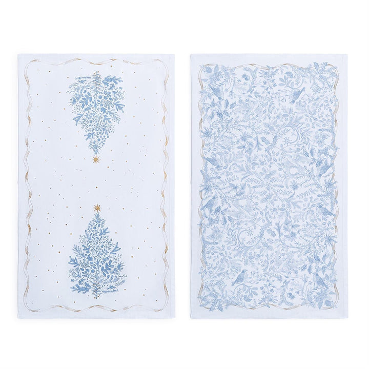 Gilded Cottage Dish Towels: one with two blue botanical trees and gold stars, the other with a dense blue botanical pattern and birds.