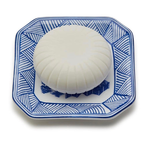 Round, white, ridged Blue Willow Sandalwood Scented French Milled Soap. Available in 50g and 100g sizes.