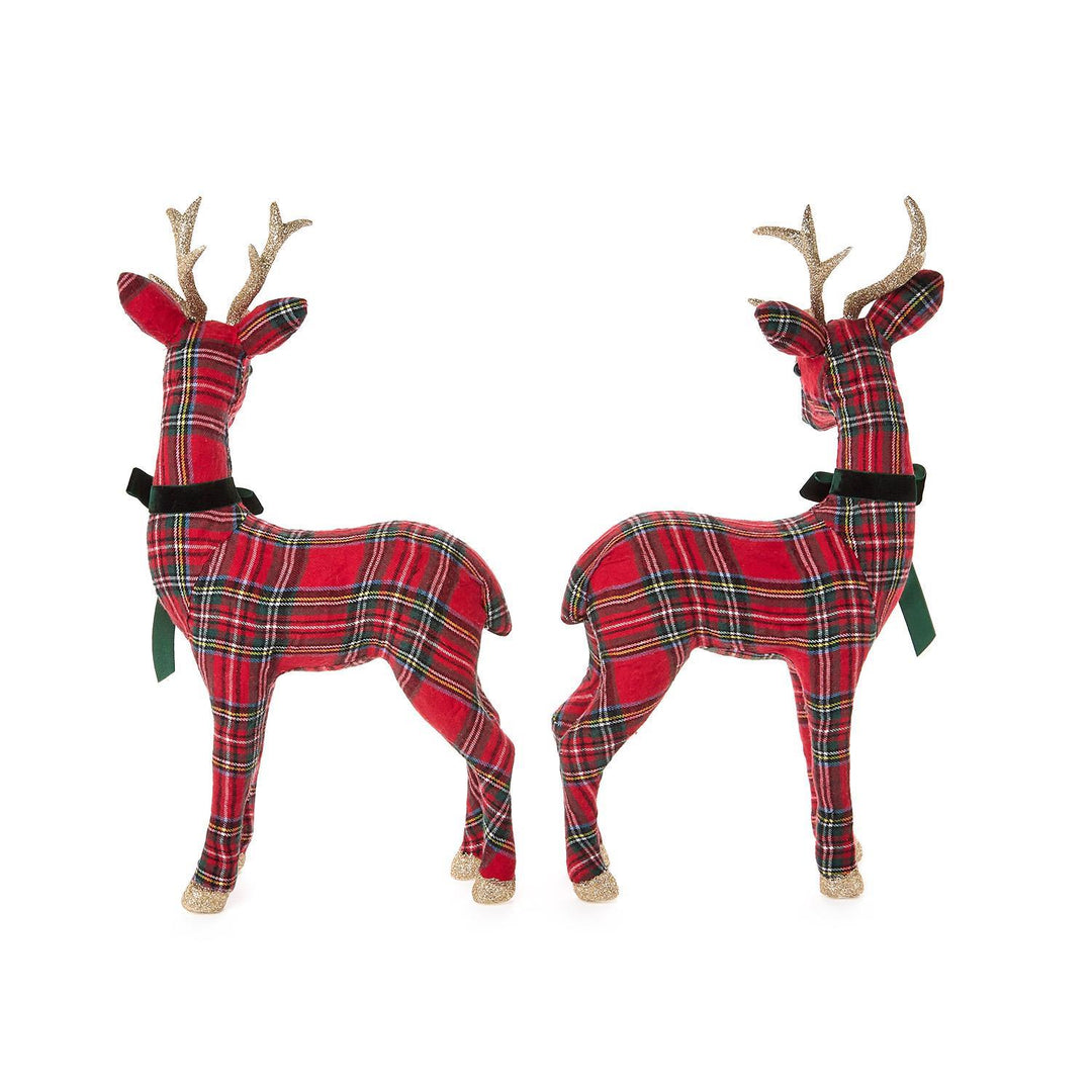 Two tartan reindeer figures in red fabric with glittery gold accents and black ribbon collars.