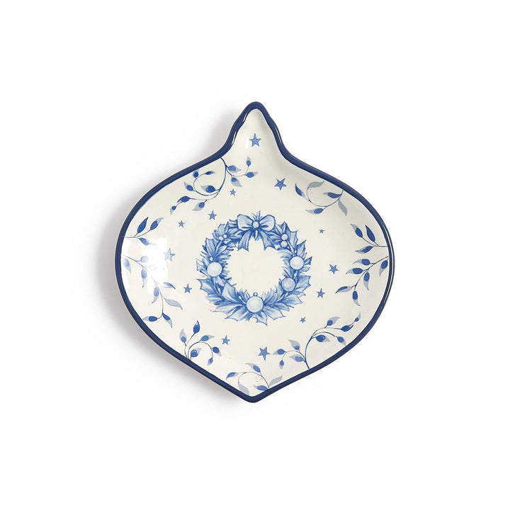 Season’s Gala ornament-shaped blue-and-white tidbit dish with wreath, leaf, and star pattern.