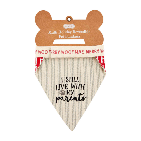 Santa’s Favorite Pup Reversible Holiday Bandana with vertical stripes and “I STILL LIVE WITH MY parents” on one side and a red and white pattern with “MERRY WOOFMAS” on the other.