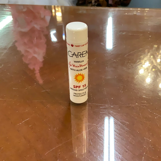 Caren Vanilla Lip Treatment tube with SPF 15 and aloe vera. Available in one standard size.