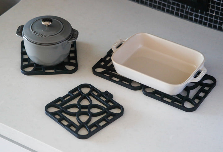 Interlocking Trivets shown in multiple pieces; available in small, medium, and large sizes.