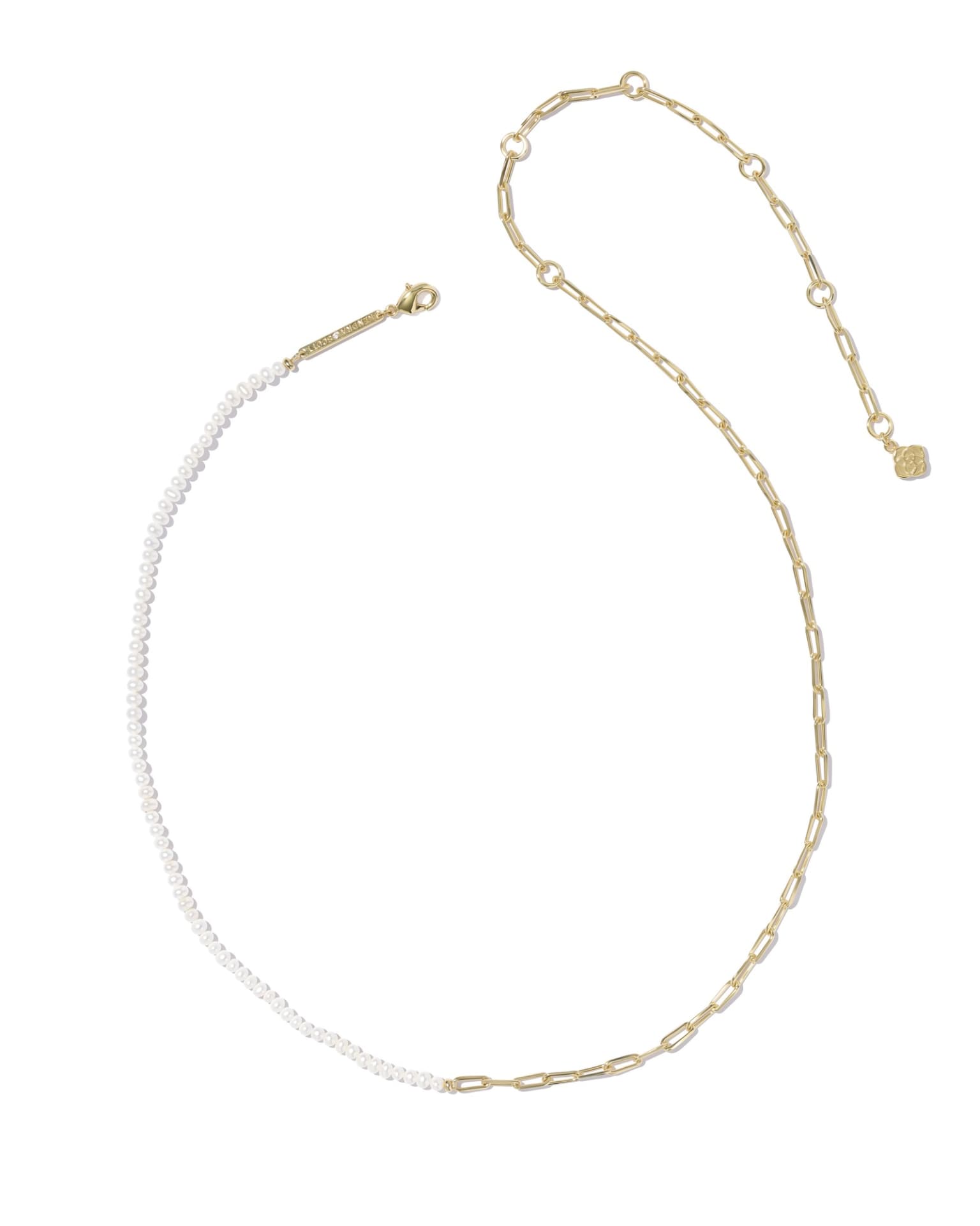 Gold necklace with one side of freshwater pearls, one side gold links, finished with small gold charm. Available in 16" and 18".