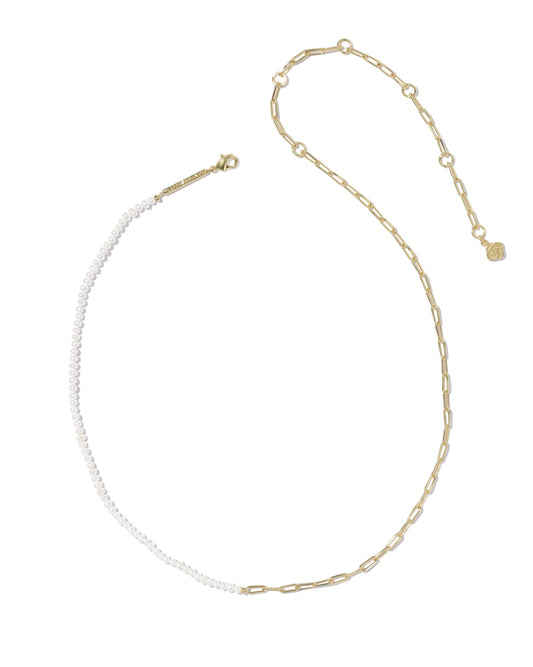 Gold necklace with one side of freshwater pearls, one side gold links, finished with small gold charm. Available in 16" and 18".