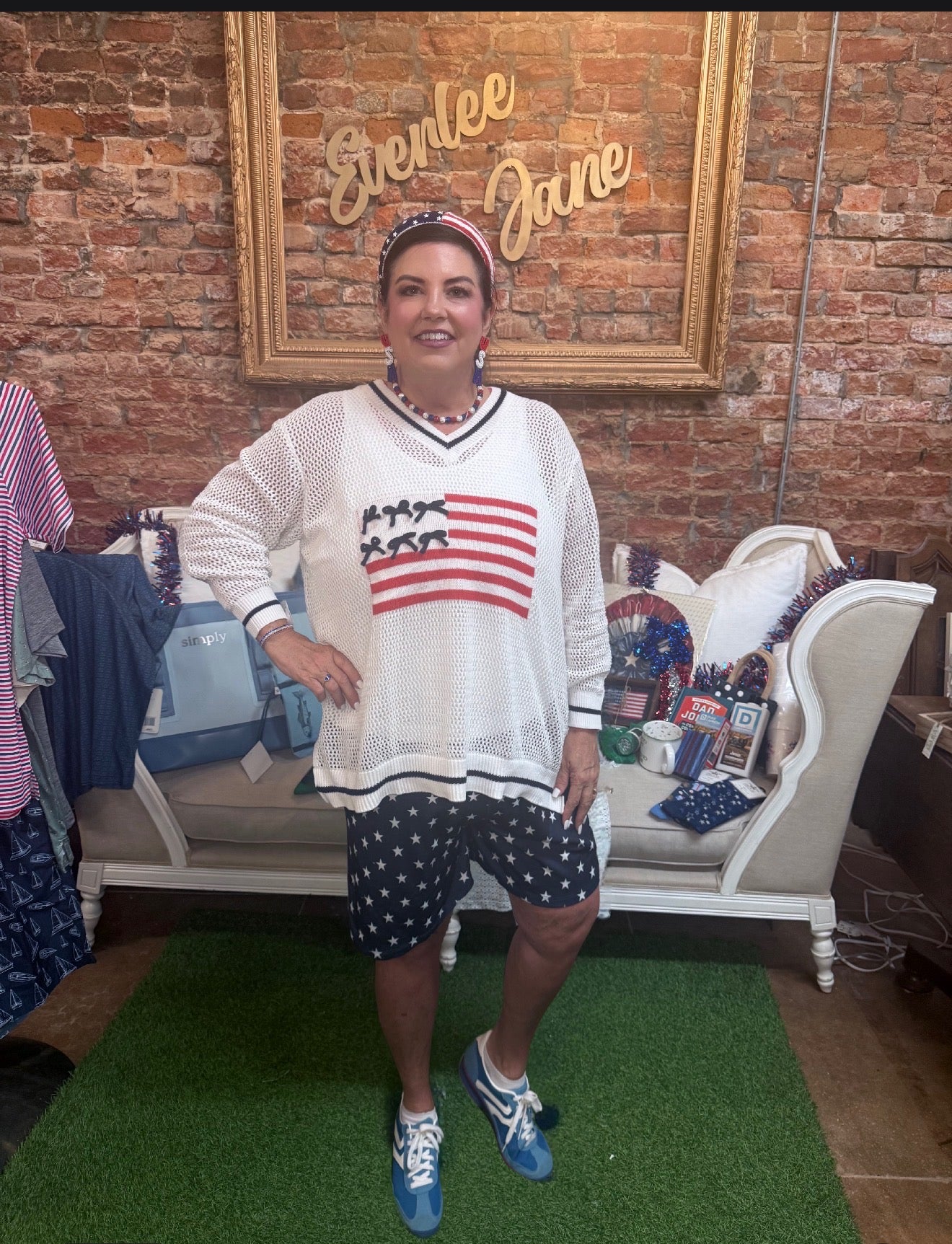 Americana Flag Sweater: white open knit V-neck; available in sizes S-XL.