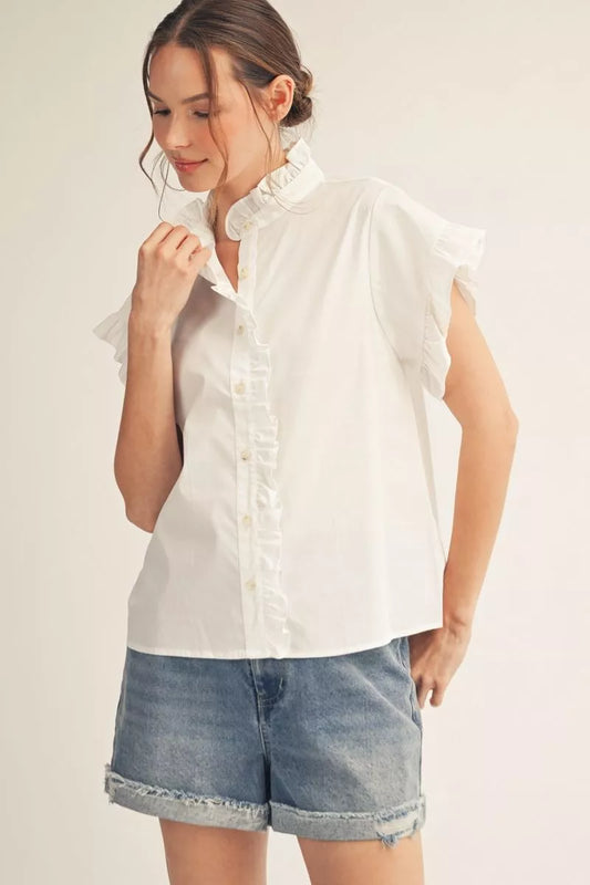 White Drop Shoulder Ruffle Top with loose fit and soft detailing. Available in sizes XS–XL.