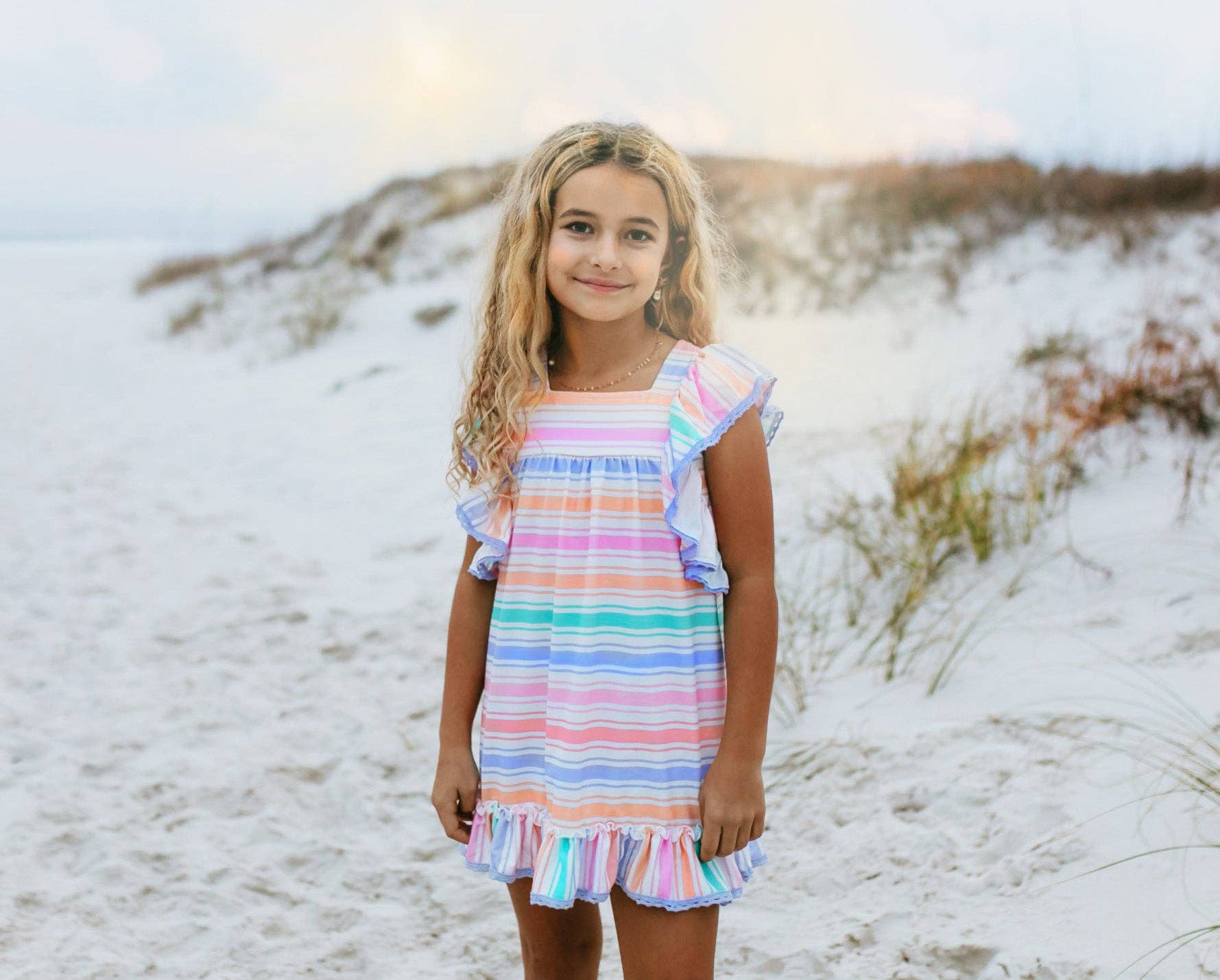 Girls Pastel Rainbow Stripe Ruffles & Lace Spring Dress, available in sizes 2T-10.