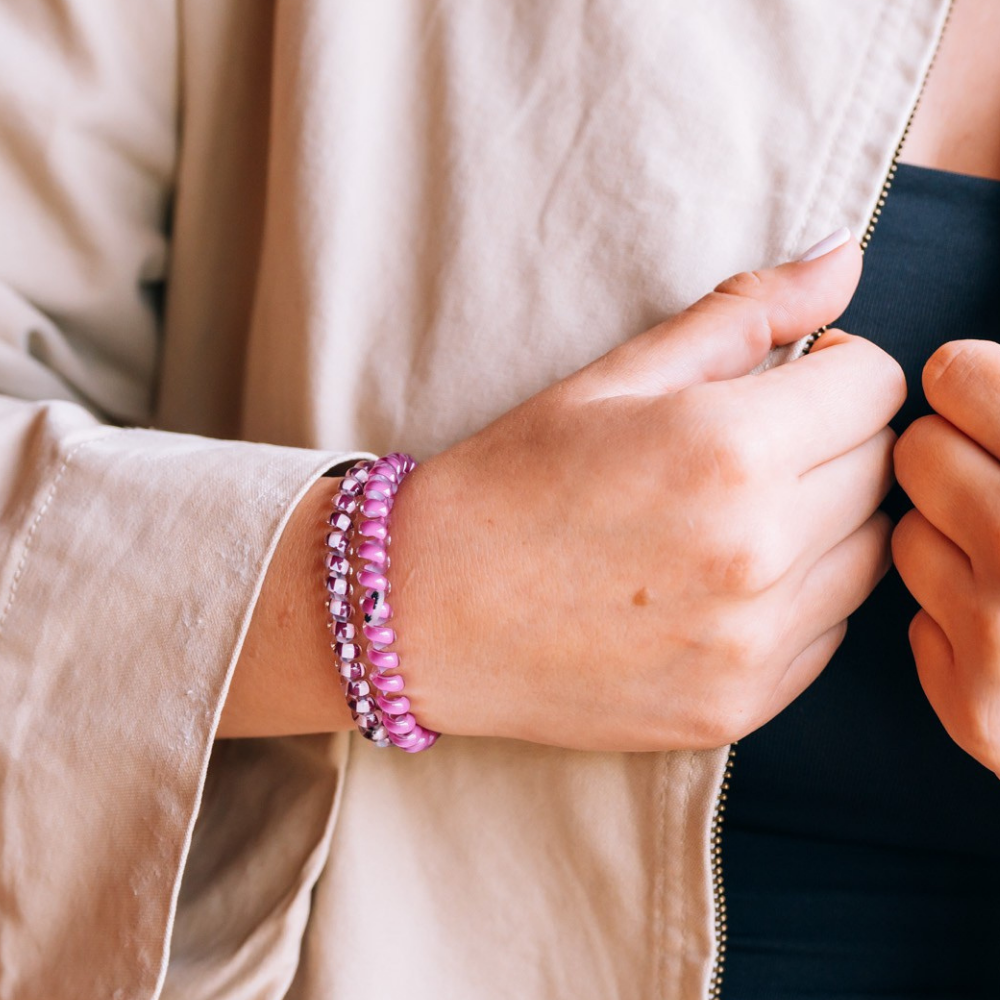 Merlot after Midnight Small Hair Ties in a spiral, no-crease design shown on wrist; available in small size.