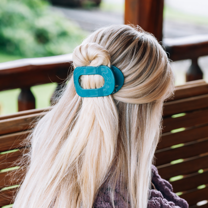 Teal With It Medium Flat Round Hair Clip, shown in use. Available in medium size.