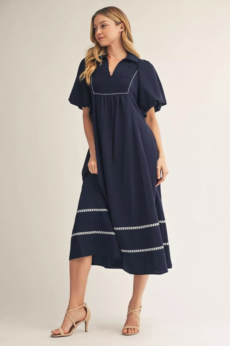 Dark Navy Stripe Contrast Midi Dress with puff sleeves, white trim; available in sizes XS-L.