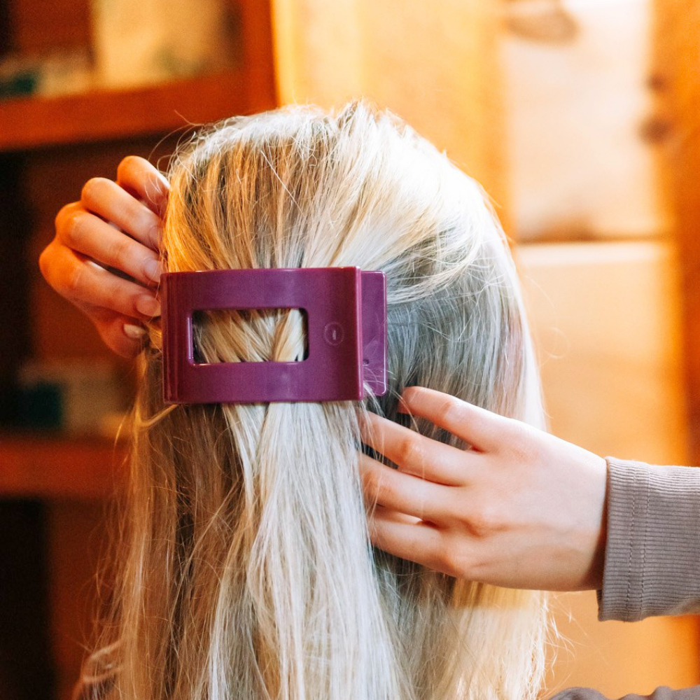 Mulberry Medium Flat Rectangle Hair Clip in use; available in multiple sizes.