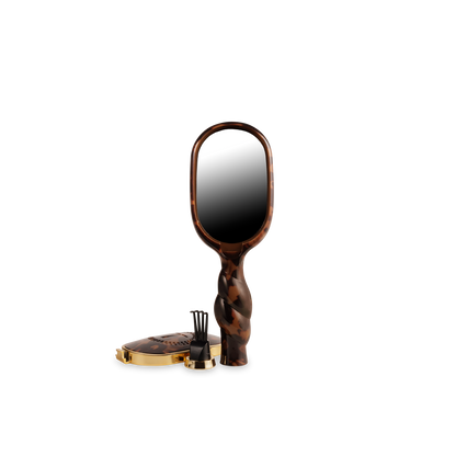 Brown tortoiseshell-patterned hand mirror; available in small and large sizes.