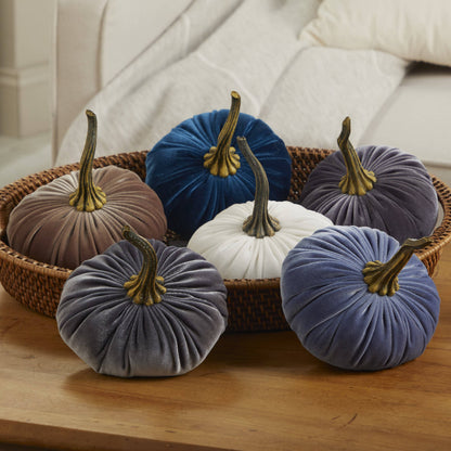 Six large velvet pumpkins in blue, brown, gray, white, and purple displayed in a wicker basket. Available in multiple sizes.