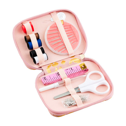 Leopard Sewing Kit: Compact with organized compartments. Contains 4 thread spools (black, red, white, blue), circular needle case with needles, pink measuring tape, white scissors, pins, seam ripper, and thimble. Available size: One Size.