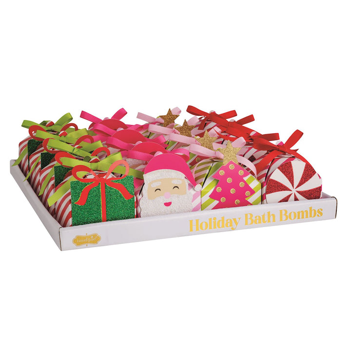 Pastel Holiday Bath Bombs in Santa, Christmas tree, and peppermint candy gift boxes.