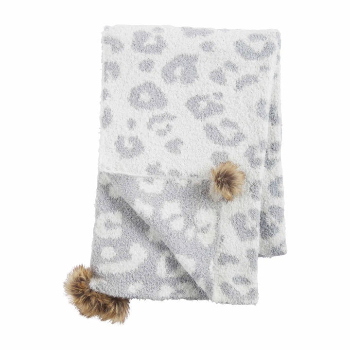 Leopard Chenille Scarf with soft white and gray print, fuzzy brown pom-poms on two corners. Sizes: S, M, L.