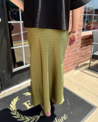 Olive-green polka dot satin midi skirt, available in sizes XS-XL.
