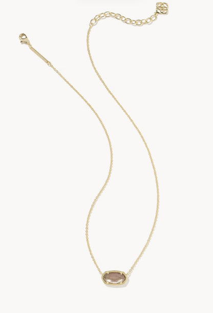 Elisa Necklace Gold Taupe by Kendra Scott is a short gold chain necklace with an adjustable clasp and a small oval taupe gemstone pendant in a gold frame. Available in one size.