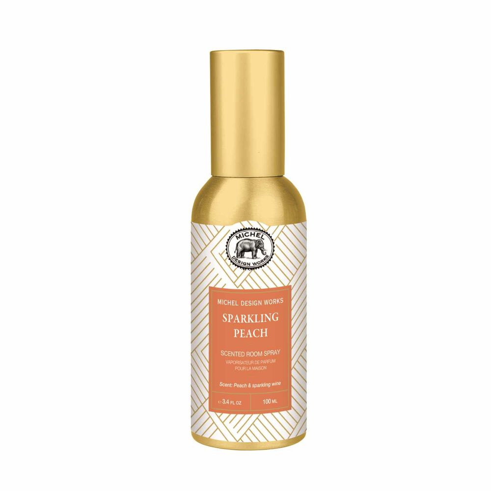 Sparkling Peach Room Spray in a gold and peach bottle with line patterns and round logo. Available in 100ml and 250ml sizes.