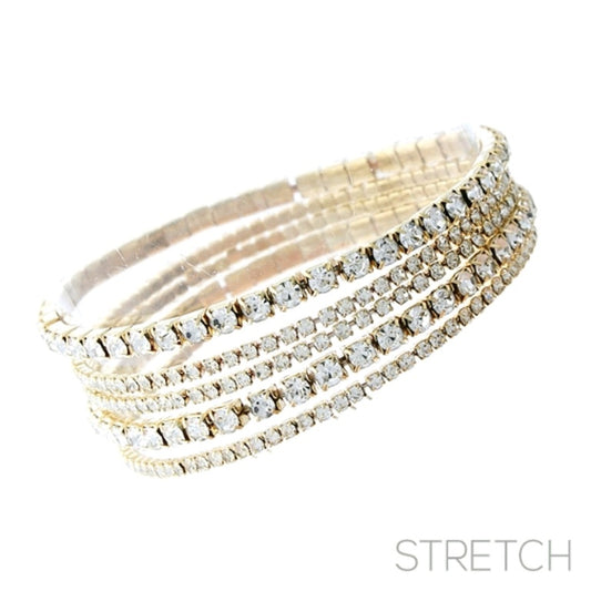 Gold-tone Mica Bracelet with parallel rows of clear crystals, flexible stretch fit. Available in S, M, L sizes.