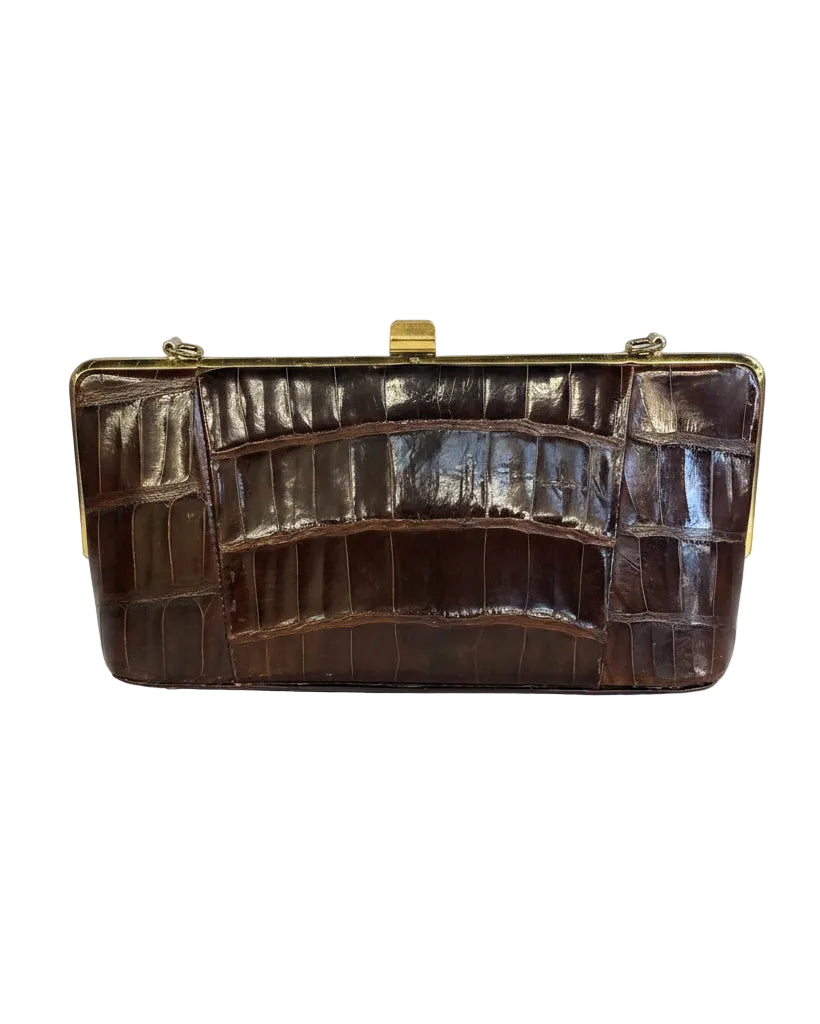 Vintage Charles Jourdan Paris Genuine Alligator Clutch in dark brown with a rectangular shape, gold-tone metal frame, and clasp closure. Size options not specified.