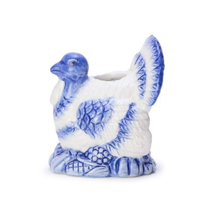 Blue and white hand-painted turkey candleholders, available in small and medium sizes.