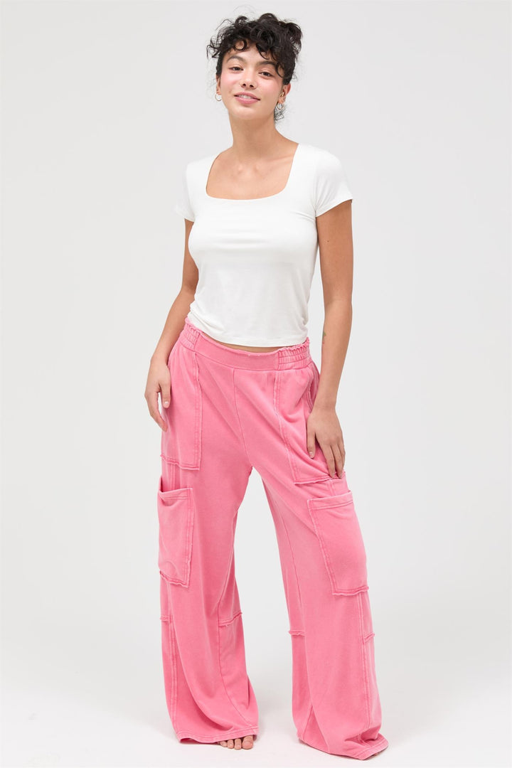Mineral Wash Wide Leg Cargo Pants in pink with high rise, loose fit, large pockets. Available in sizes XS-XL.