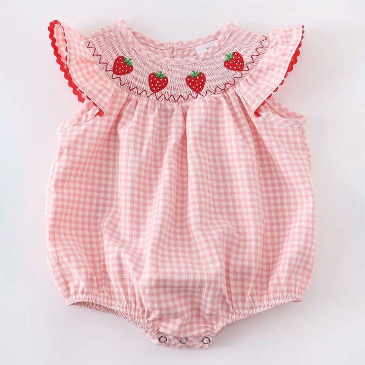 Pink and white plaid romper, ruffled sleeves, red trim, strawberry embroidery at collar, snaps at bottom. Size: 18M.