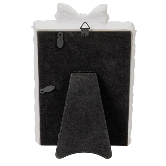 Plastic photo frame with bow, antique white edge, black stand, swivel tabs, metal hook. Fits 4x6 photos.