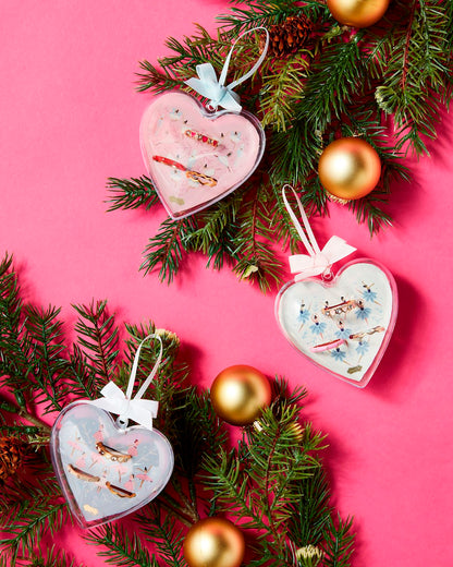 Three heart-shaped Ballerina Ornament Ring Set with bows; available in small, medium, and large sizes.