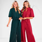Annalise Jumpsuit shown in dark green and red; available in sizes XS-XL.