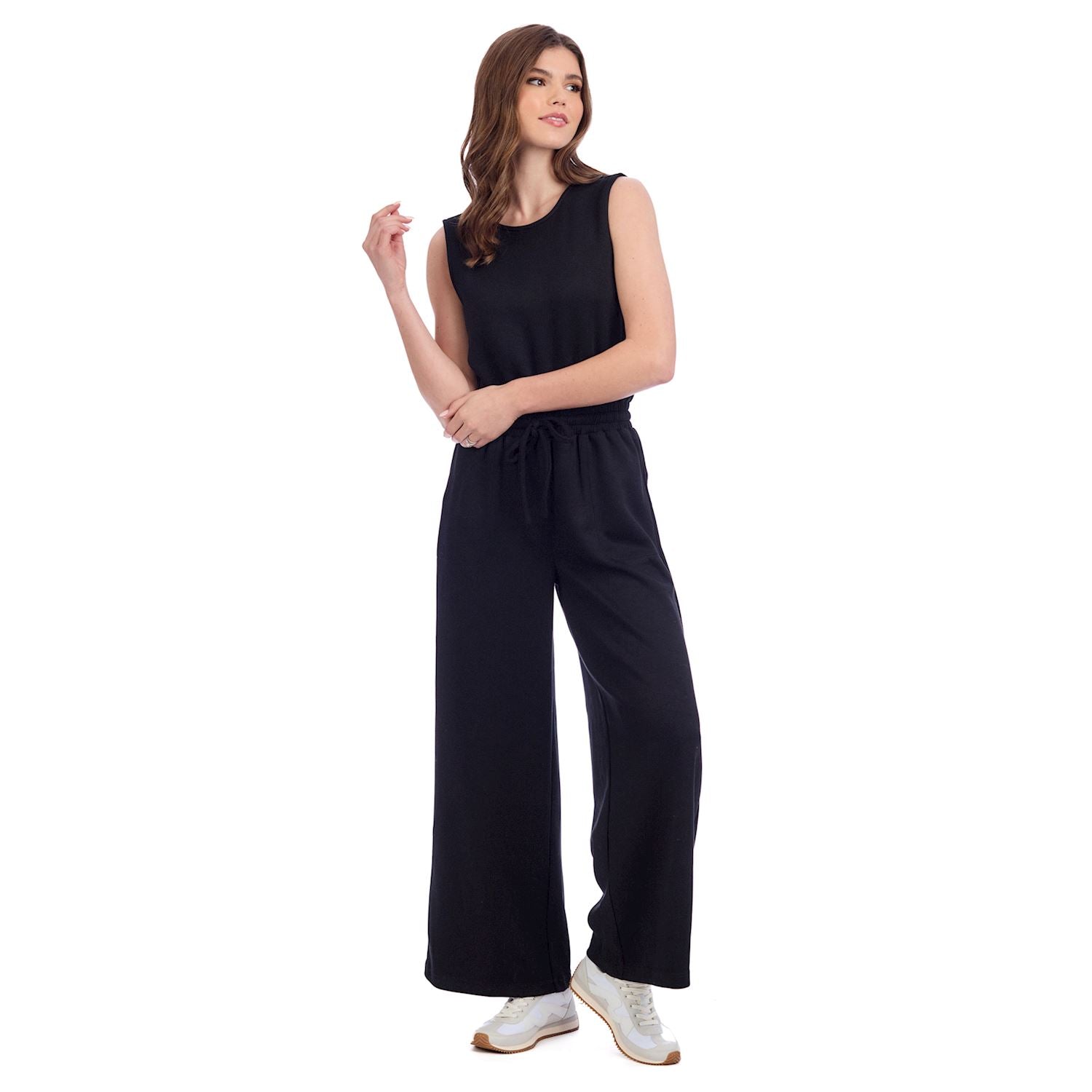 Atlas Jumpsuit: sleeveless black scuba knit, wide-leg pants. Available in sizes XS–XL.