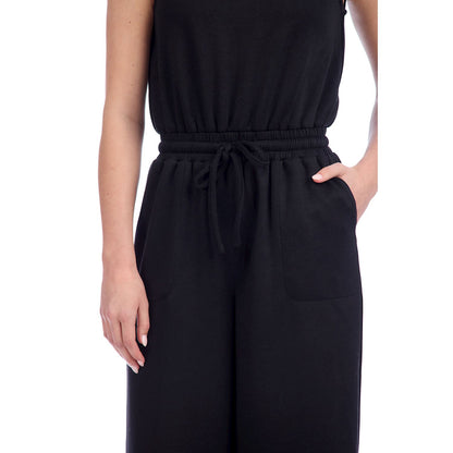 Atlas Jumpsuit: sleek black sleeveless design, available in sizes XS–XL.