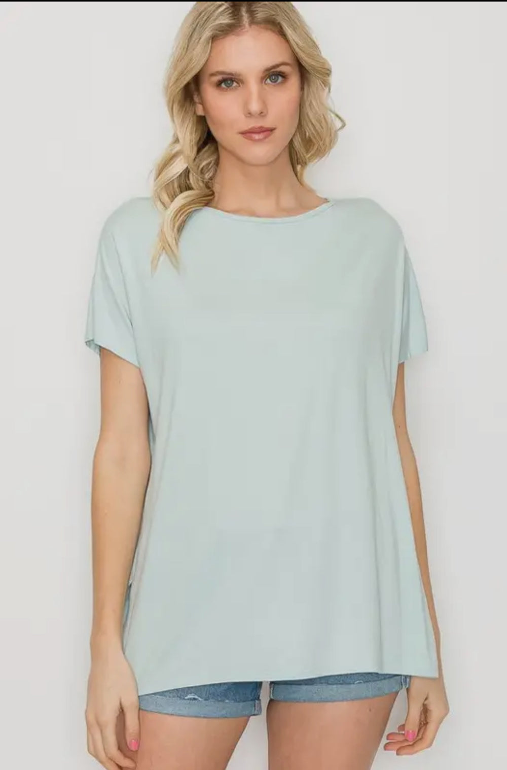 The Perfect Shirt: light blue rayon blend, comfortable fit, available in sizes XS–XL.